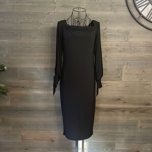 EUC off the shoulder arm cut out boo-hoo little black dress